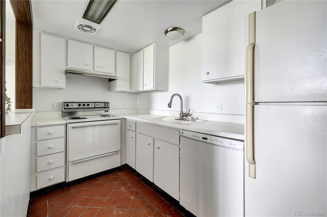 2525 S Dayton Way Unit 1510, Denver, CO 80231 - kitchen featuring white appliances, white cabinets, under cabinet range hood, light countertops, and dark tile patterned flooring