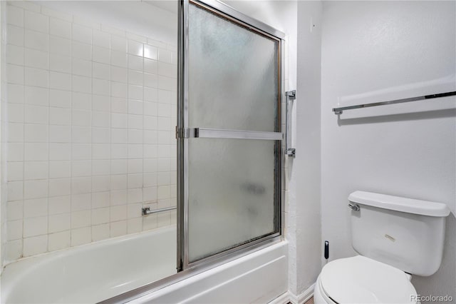 2525 S Dayton Way Unit 1510, Denver, CO 80231 - bathroom with toilet and enclosed tub / shower combo
