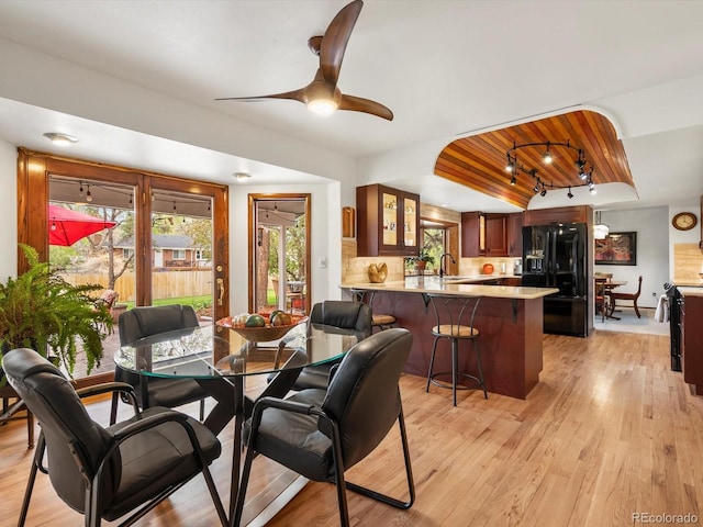 5845 W Portland Dr, Littleton, CO 80128 - dining room with light wood-style floors and a ceiling fan
