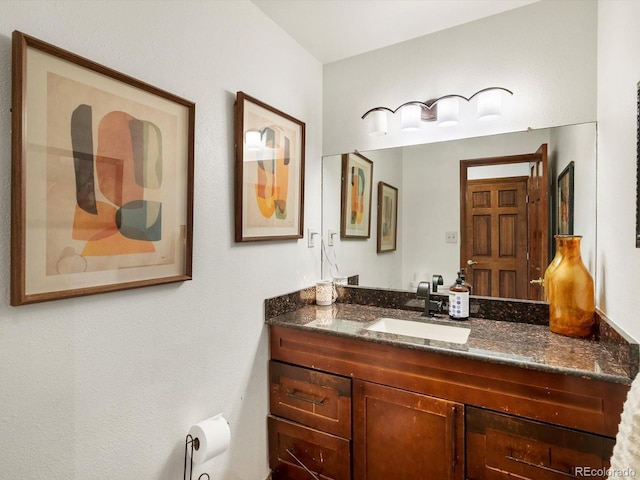 5845 W Portland Dr, Littleton, CO 80128 - bathroom featuring vanity