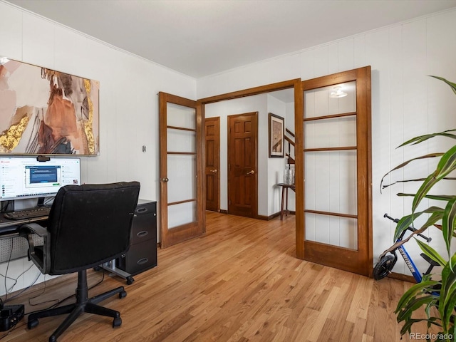 5845 W Portland Dr, Littleton, CO 80128 - home office with light wood-style floors and french doors
