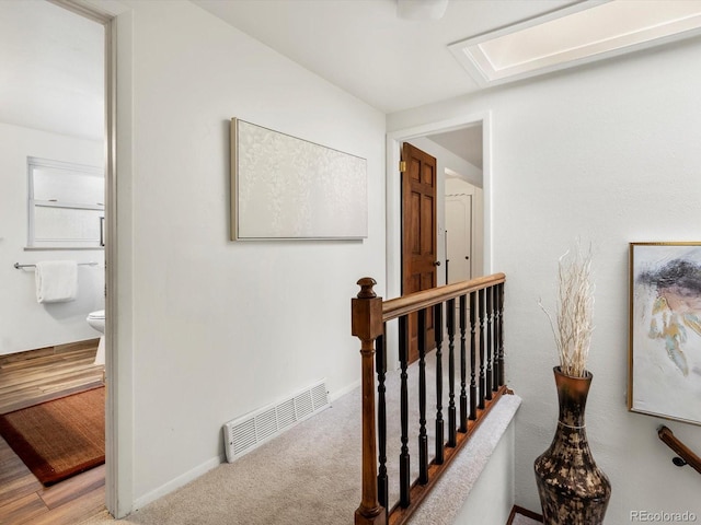 5845 W Portland Dr, Littleton, CO 80128 - hall featuring an upstairs landing and carpet floors