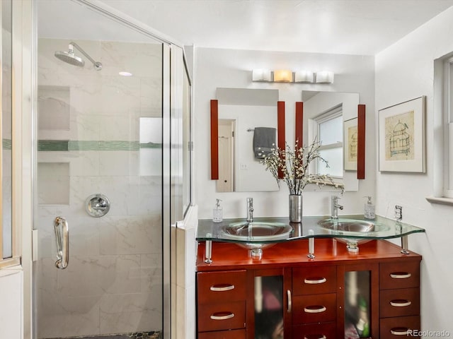 5845 W Portland Dr, Littleton, CO 80128 - bathroom featuring a stall shower and double vanity