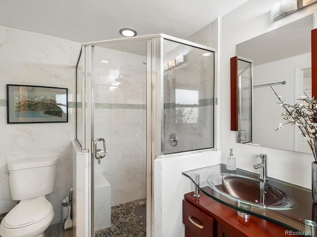 5845 W Portland Dr, Littleton, CO 80128 - full bath featuring vanity, a stall shower, and toilet