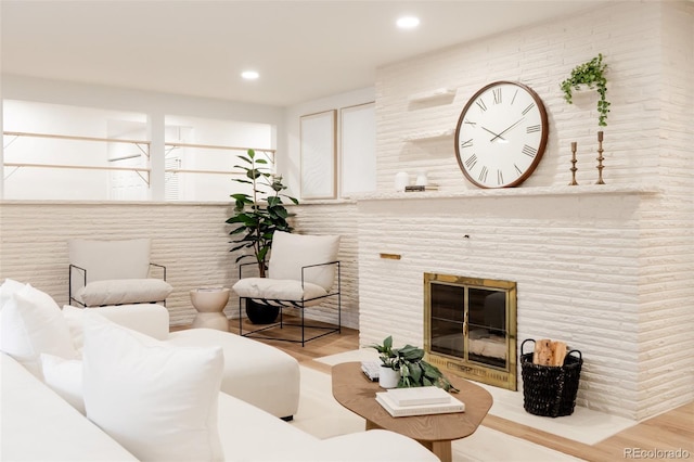4395 Newland St, Wheat Ridge, CO 80033 - living area with wood finished floors, recessed lighting, and a large fireplace