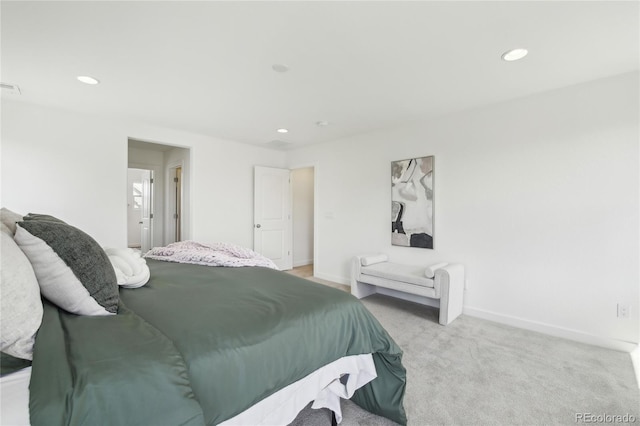 bedroom with recessed lighting, visible vents, baseboards, and light carpet