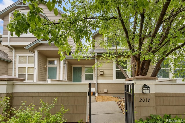 2017 N Fork Dr, Lafayette, CO 80026 - view of front of home with a fenced front yard and a gate