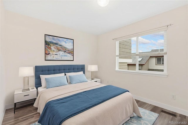 2017 N Fork Dr, Lafayette, CO 80026 - bedroom with baseboards and wood finished floors