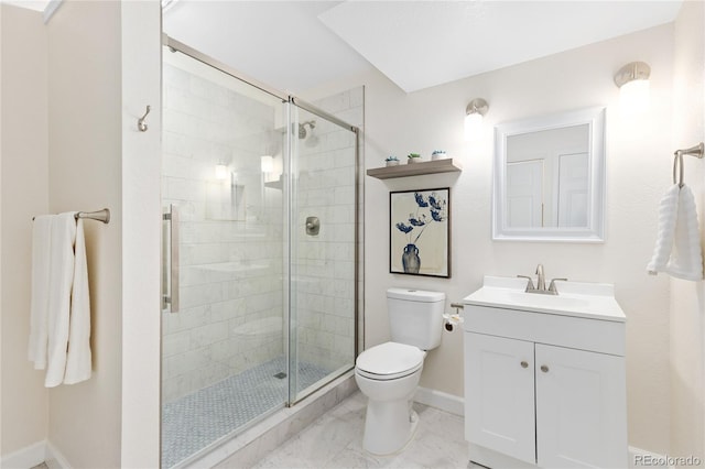 2017 N Fork Dr, Lafayette, CO 80026 - bathroom featuring toilet, baseboards, marble look tiles, vanity, and a shower stall