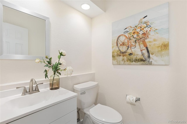 2017 N Fork Dr, Lafayette, CO 80026 - half bathroom featuring vanity and toilet