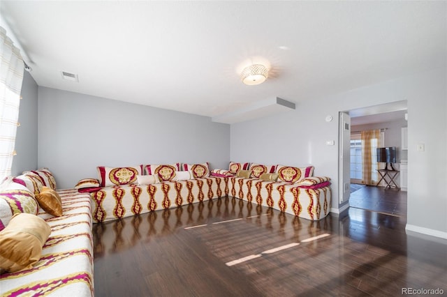 living room with dark wood-type flooring