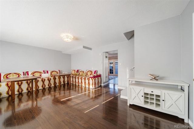 interior space with dark hardwood / wood-style flooring