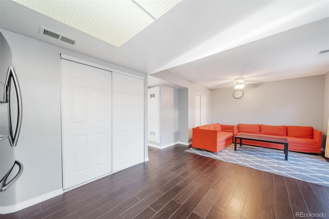 living room featuring dark hardwood / wood-style flooring