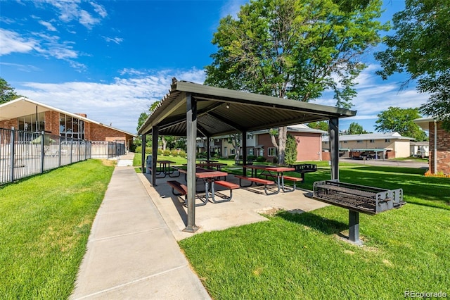 surrounding community featuring a lawn and a gazebo