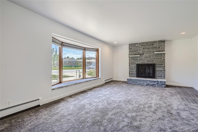 unfurnished living room with a baseboard radiator, a fireplace, and carpet flooring