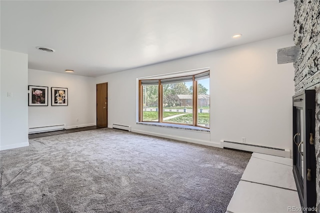 unfurnished living room featuring carpet and a baseboard radiator