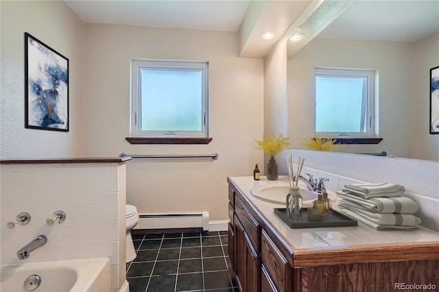 bathroom with a bath, toilet, a baseboard heating unit, and a wealth of natural light