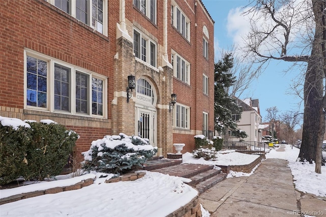 view of snow covered building