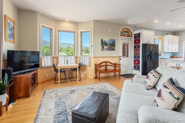 10 N Price Park, Cotopaxi, CO 81223 - living room with wainscoting, light wood-type flooring, recessed lighting, and ceiling fan