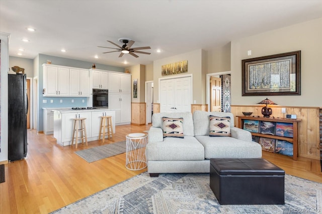 10 N Price Park, Cotopaxi, CO 81223 - living room featuring a ceiling fan, light wood finished floors, recessed lighting, and wainscoting