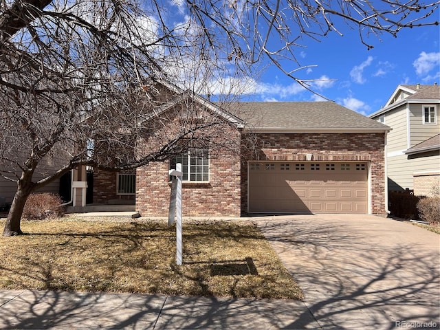 single story home with brick siding, concrete driveway, a garage, and a shingled roof