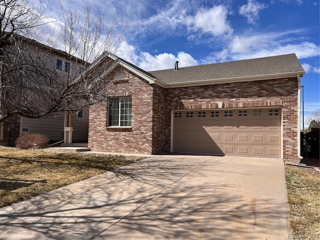 view of front facade with brick siding, an attached garage, driveway, and a shingled roof