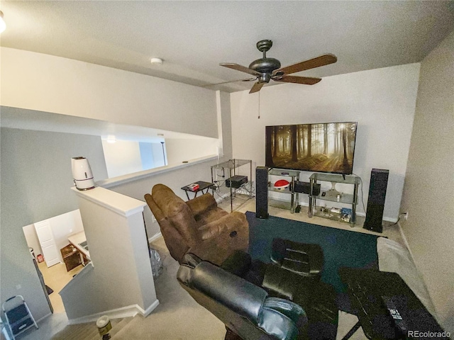 living room featuring ceiling fan and carpet floors