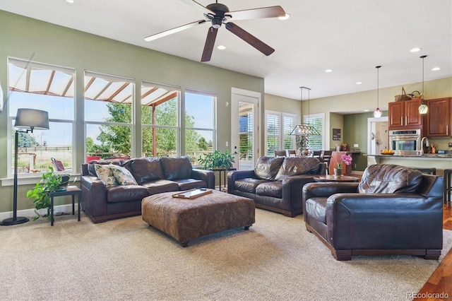 5463 Killen Ave, Castle Rock, CO 80104 - living area with recessed lighting, ceiling fan, and light colored carpet
