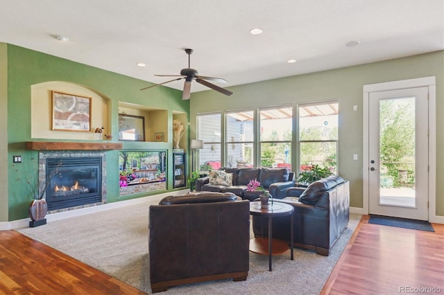 5463 Killen Ave, Castle Rock, CO 80104 - living room featuring plenty of natural light, wood finished floors, ceiling fan, a glass covered fireplace, and recessed lighting