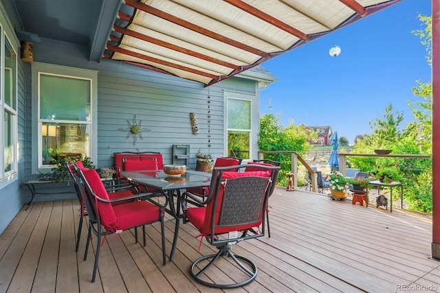 5463 Killen Ave, Castle Rock, CO 80104 - wooden terrace with outdoor dining area