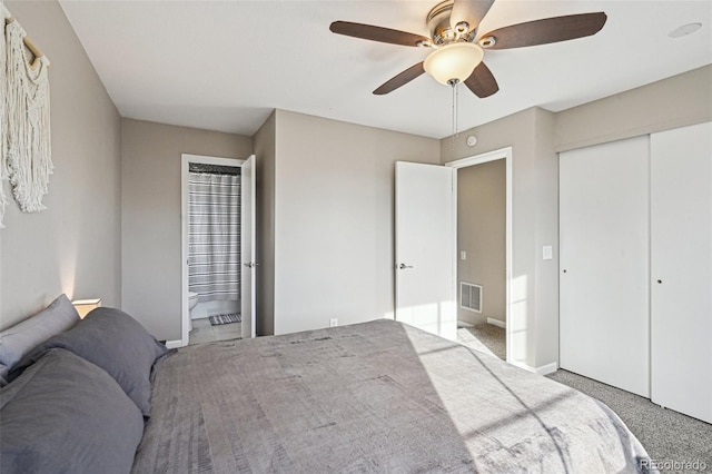 bedroom featuring baseboards, visible vents, ceiling fan, carpet, and a closet