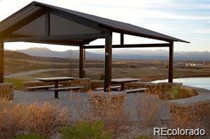 view of community with a water view and a gazebo