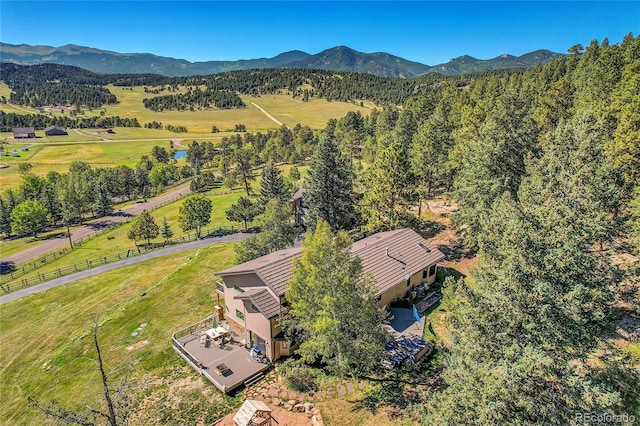 bird's eye view with a mountain view and a rural view