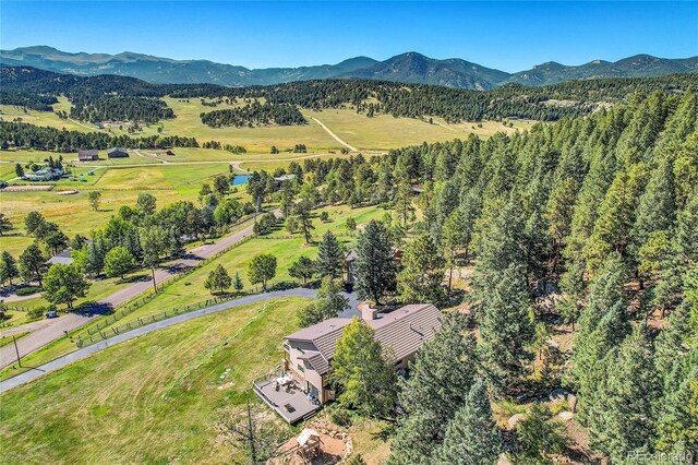 bird's eye view with a mountain view