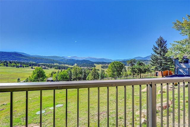 view of mountain feature with a rural view