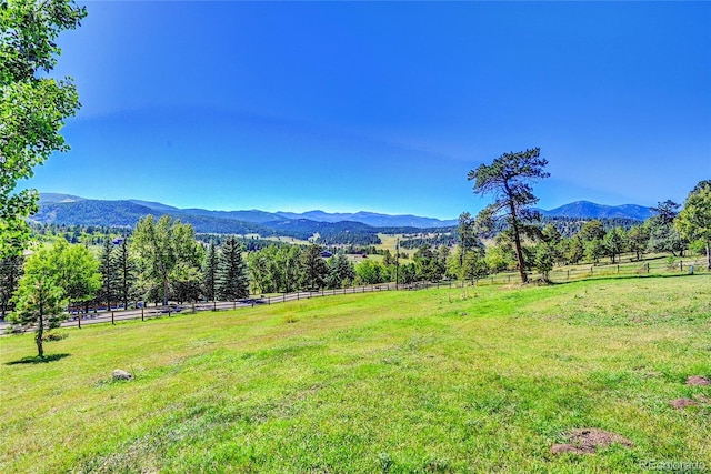 property view of mountains with a rural view