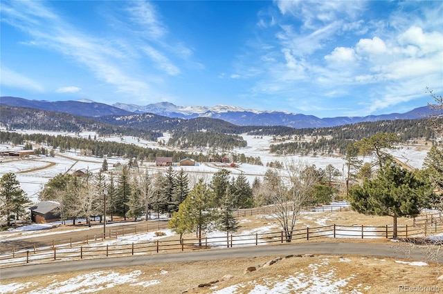 view of mountain feature featuring a rural view