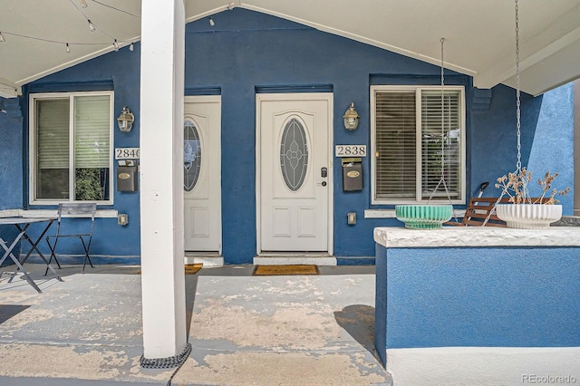2838 Decatur St, Denver, CO 80211 - entrance to property featuring a porch and stucco siding