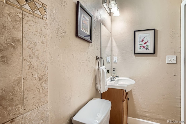 2838 Decatur St, Denver, CO 80211 - half bath with vanity and toilet