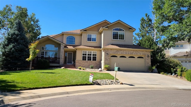 front of property with a garage and a front yard