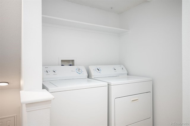 washroom with washer and clothes dryer