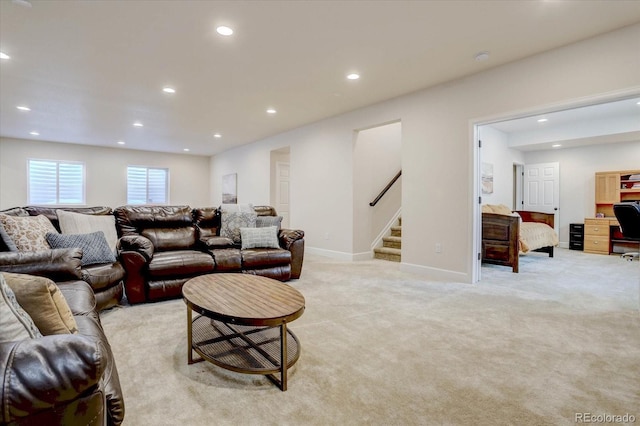 living room featuring light colored carpet