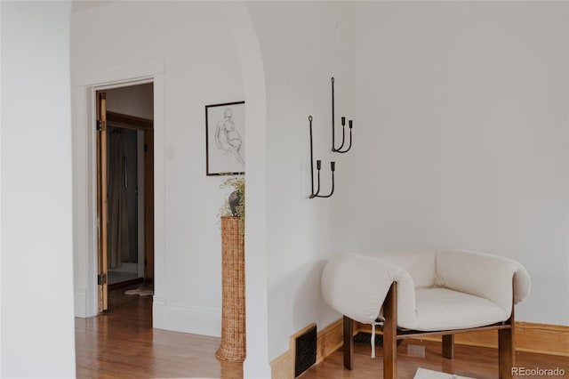 461 S Sherman St, Denver, CO 80209 - living area featuring wood finished floors and arched walkways