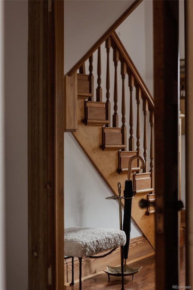 461 S Sherman St, Denver, CO 80209 - stairway featuring wood finished floors