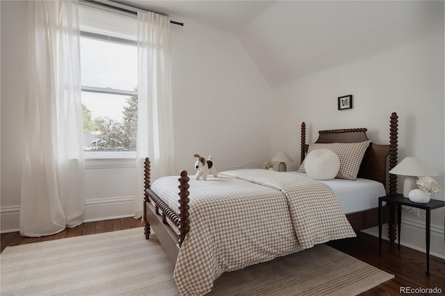 461 S Sherman St, Denver, CO 80209 - bedroom featuring wood finished floors and vaulted ceiling
