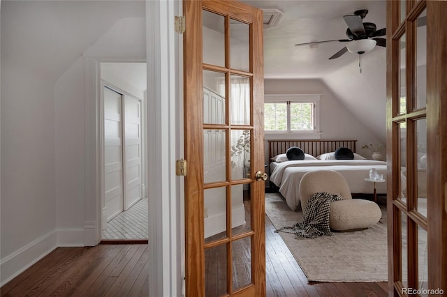461 S Sherman St, Denver, CO 80209 - bedroom with lofted ceiling, wood-type flooring, and french doors