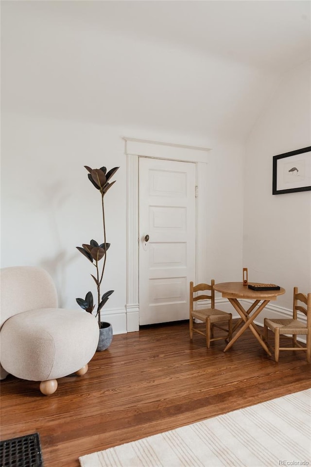 461 S Sherman St, Denver, CO 80209 - sitting room featuring lofted ceiling and wood finished floors