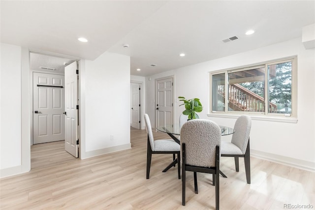 5814 Cole Way, Arvada, CO 80004 - dining area featuring light wood-style flooring and recessed lighting