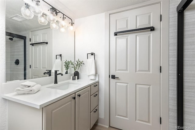 5814 Cole Way, Arvada, CO 80004 - full bathroom featuring vanity and a shower with door