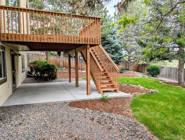 5814 Cole Way, Arvada, CO 80004 - fenced backyard featuring a patio area and a deck